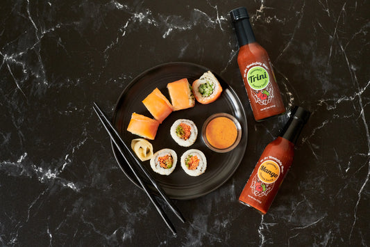 wawm® trini pepper sauce and mango pepper sauce with sushi